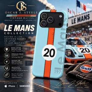 May include: A light blue phone case featuring a vertical orange racing stripe and a white circular emblem with the number 20 in black. The case has a black camera cutout and the text Le Mans 1970 printed in a light gray font on the side.