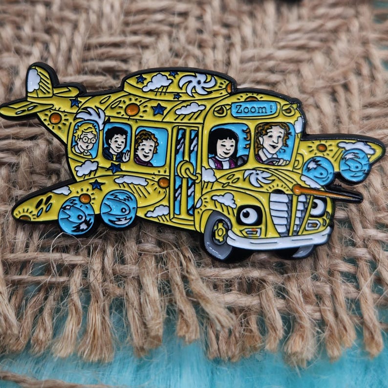 May include: A yellow school bus with wings, painted with clouds, stars, and suns. The bus has a sign that says "Zoom!" and five children are sitting inside. The bus is a pin.