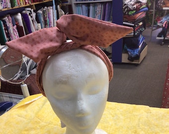 Pretty rose colored wired headband