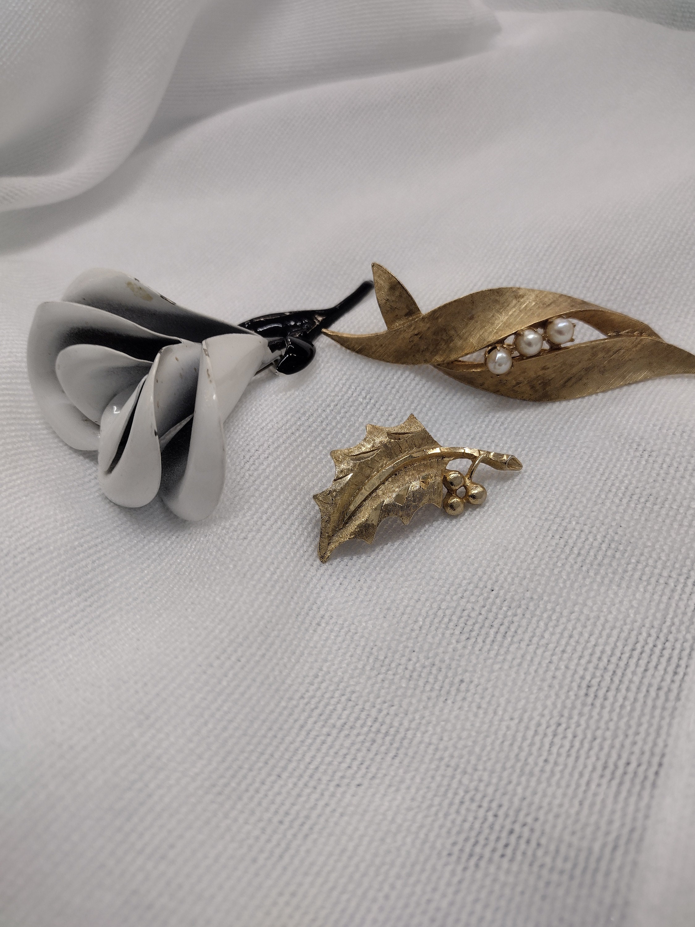 Three vintage brooches