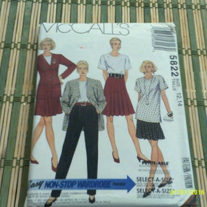 McCalls 5822 Misses&#39; unlined jacket, top in two lengths , skirt and pants pattern. Size 12-14