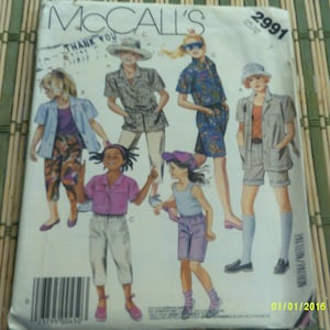 McCalls 2991 Girls shirt, tie, belt, top, pants and shorts pattern. Size 7