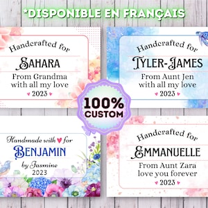 May include: Four printable gift tags with watercolor backgrounds and floral designs. The tags feature the text "Handcrafted for", followed by a name, and a message from a family member. The tags also include the year 2023.