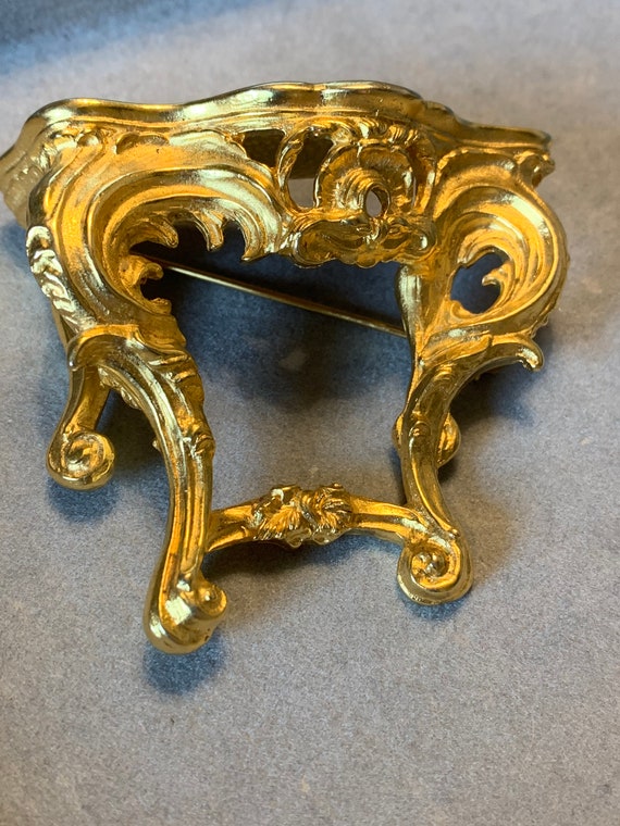 Karl Lagerfeld directive sculptural pin brooch