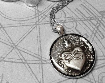 Sacred Heart : hand embossed metal pendant necklace