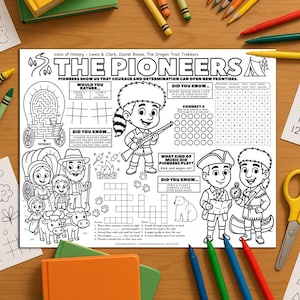 May include: A black and white colouring page titled "The Pioneers" with illustrations of pioneers, a maze, and a word search. The page includes text and is surrounded by crayons, pens, and notebooks.