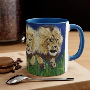 Pride of Lions on the Run Accent Coffee Mug, 11oz