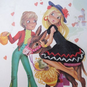 Vintage novelty postcard. Spanish - couple with donkey. Black embroidered dress.