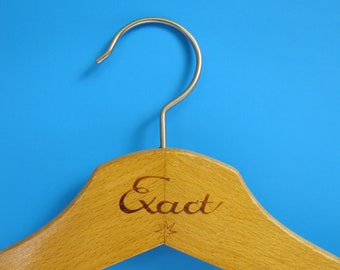 Vintage wooden coat hanger. Unusual shape, with loop grooves and 'Exact' advertising branding. Vintage advertising hanger