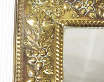 Vintage, rectangular, brass-framed  mirror with foliage relief pattern. Fabulous!