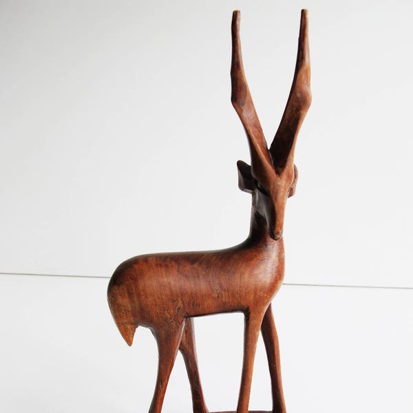 Mid century modern wooden deer. Elegant and stylish.