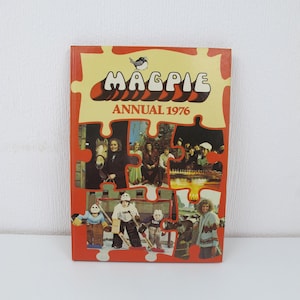 May include: A vintage "Magpie Annual 1976" book. The cover has a puzzle-piece design with a bird illustration and the title in a retro font. The cover includes images of people and hockey players.