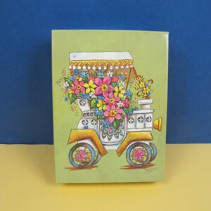 Vintage Geschenkbox mit Abbildung eines Autos mit Blumen im Seventies-Design. Leere Vintage Dose. Tolle vintage Aufbewahrungsdose!