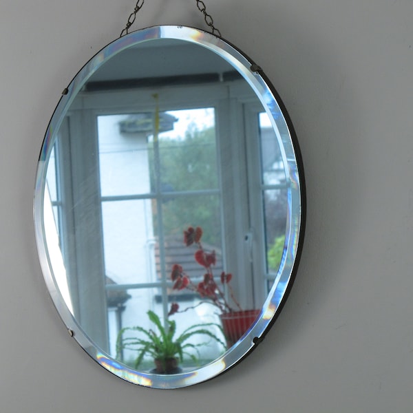 Art Deco mirror. Bevelled edge frameless round wall mirror. Ready to hang on original visible chain.