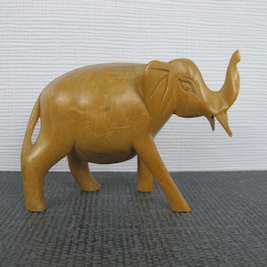 Sweet hand carved wooden elephant