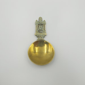 Vintage tea caddy spoon. Small Brass spoon with Holyrood Palace on the handle.