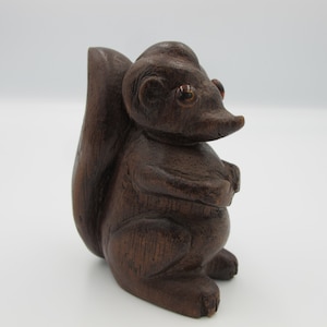 Vintage wooden squirrel. Cute hand carved wood squirrel figurine, with eyes attached 3.5 inches high