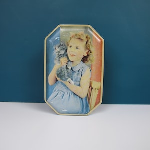Vintage octagonal sweet tin. Little girl in a blue dress and gray tabby kitten. Small Holland Toffee tin Best on Earth! 1950s