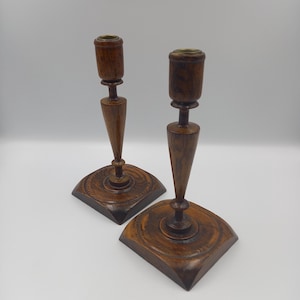 Antique English wooden candlesticks. Pair of nicely carved candlesticks with square wooden base. 8.5 inches tall (21.5cm)