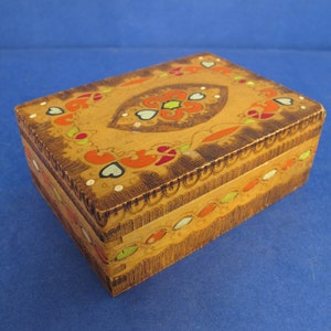 Vintage wooden cigarette box with hinged lid. Keepsake box. Jewelry box. Inscribed and painted patterns.