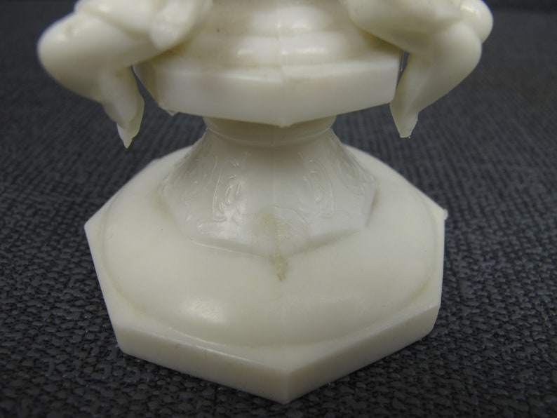 Small raised plastic planter Vintage white plastic urn with two cherubs Air plantcactus display planter. Kitsch cuteness