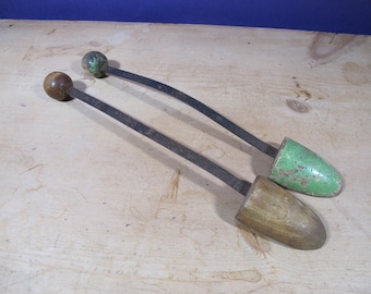 Vintage wood and metal shoe trees. Chippy green paint. Decorative shoe shapers.