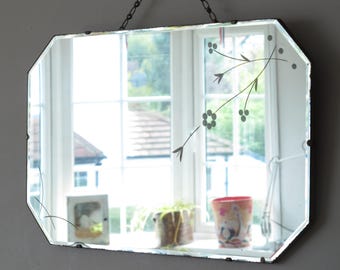 Art Deco Frameless Bevelled Mirror with cut and etched decoration. Original visible chain.