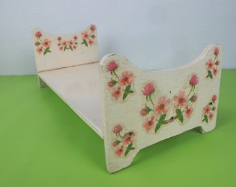 Vintage dolls bed - cute chippy paint white wooden dolls bed, with pink floral decals. 13 inches long (33cm)