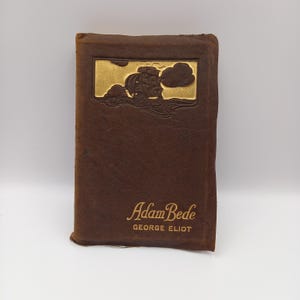 Adam Bede - by George Eliot, illustrated by A Pearse. Lovely soft oversized leather cover with gilt decoration.