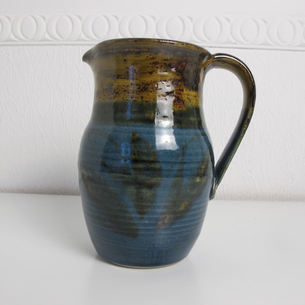 Vintage studio pottery jug or pitcher. Shiny brown and blue glazes 6.5 inches tall (16.5cm)