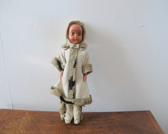 Vintage Inuit Eskimo costume doll. Girl in white leather winter suit with  fur trim. 7.5 inches tall (19cm)