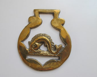 Vintage  horse brass. Leaping fish