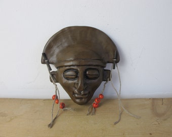 Vintage ceramic face wall hanging. Closed eyes with red bead earring detailing. Boho decor 5.5 inches