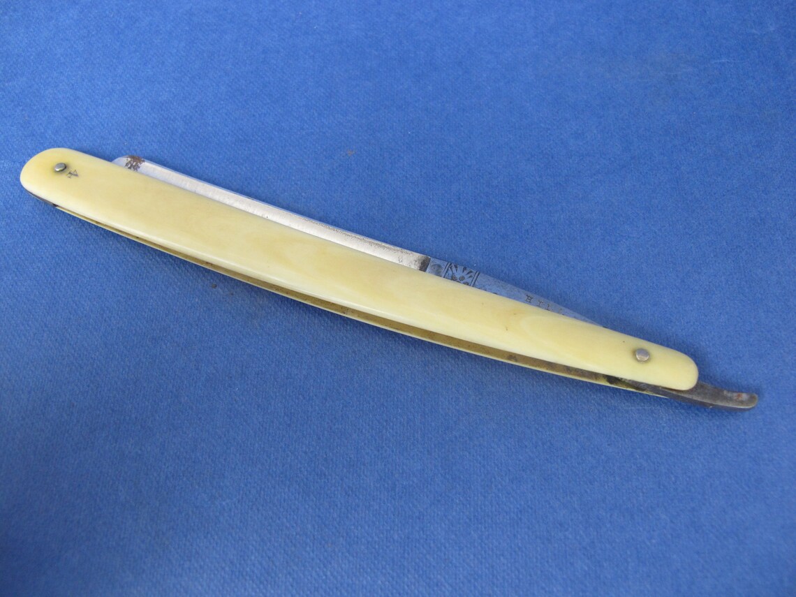 Antique Hill cut throat razor. In original box. Bone handle. Etsy