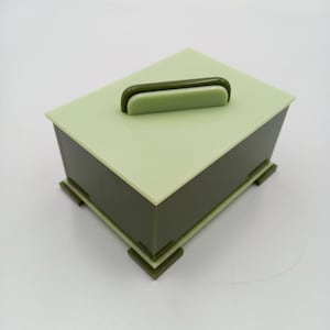 Vintage green plastic lidded box. Great Art Deco shape!