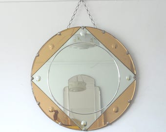 Grote art-deco afgeschuinde spiegel: roségoud en geslepen glas, originele ketting