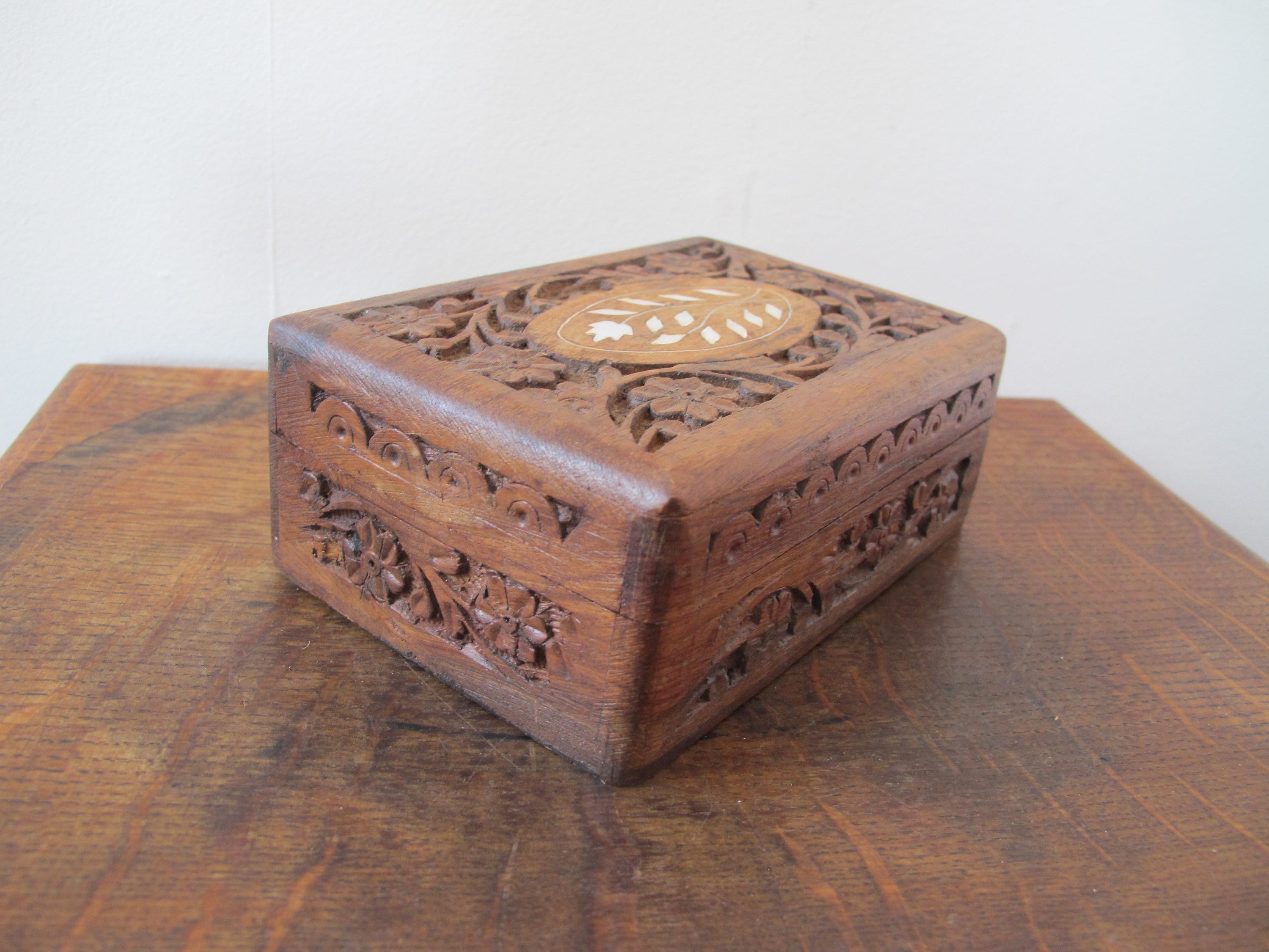 Vintage small wooden box with hinged lid and carved floral