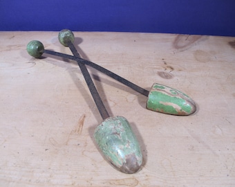 Vintage wood and metal shoe trees. Chippy green paint. Decorative shoe shapers.