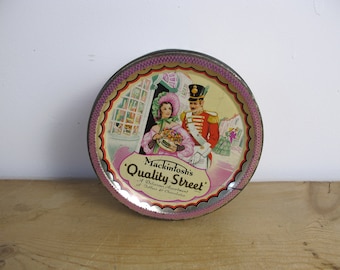 Vintage Mackintosh's Quality Street round tin. Lovely illustrations. Sweet tin for chocolates and toffees. 5 inch diameter