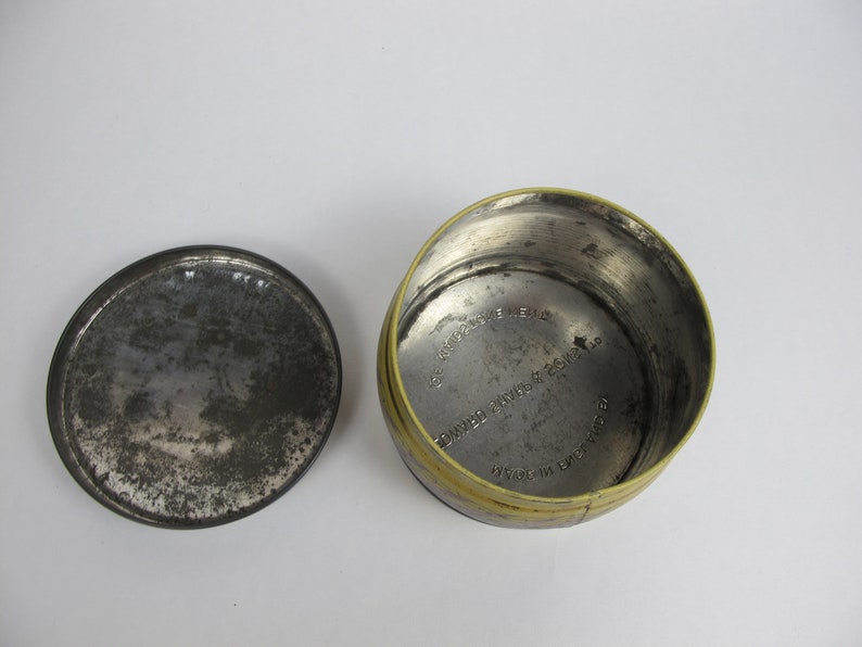 Vintage round tin Made in England. Small round toffee tin girl with parrot Edward Sharp and Sons Ltd