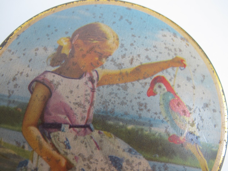 Vintage round tin Made in England. Small round toffee tin girl with parrot Edward Sharp and Sons Ltd