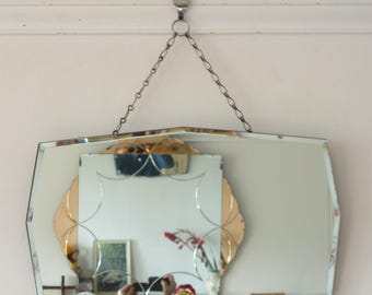 Art Deco frameless bevelled Mirror. July 1967. Original visible chain.