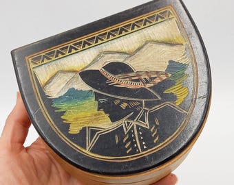 Vintage carved and painted wooden box. Horseshoe shape with image of a lady with mountains in the background