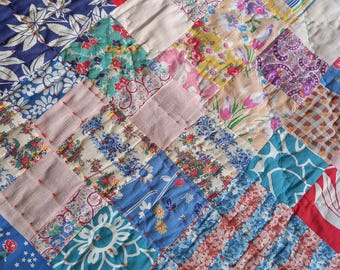 Vintage patchwork quilt. Lovely worn old soft cotton floral fabrics 172.5 x 152.5 cm (68 x 60 inches)