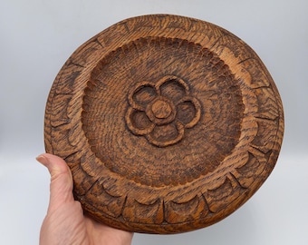 Vintage wooden shallow bowl. Hand carved with flower motif 10 inch diameter