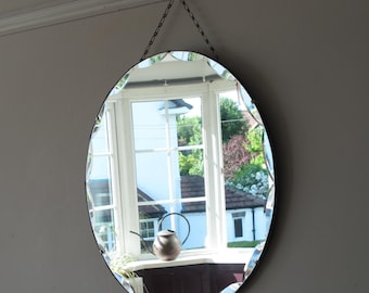 Large Round Art Deco Frameless Mirror with scalloped bevelled edge.  Ready to hang on original visible chain