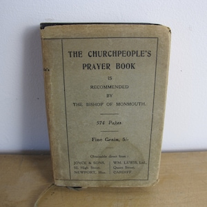May include: A vintage book titled "The Churchpeople's Prayer Book" is recommended by the Bishop of Monmouth. The book has 574 pages and is available for 5 shillings.