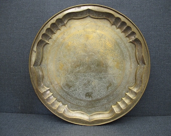 Vintage brass tray. Round tray decorated with flowers, elephants, deer, birds and fish. 14.75 inches diameter (37.5cm)