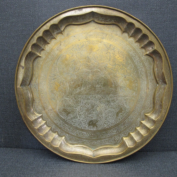 Vintage brass tray. Round tray decorated with flowers, elephants, deer, birds and fish. 14.75 inches diameter (37.5cm)