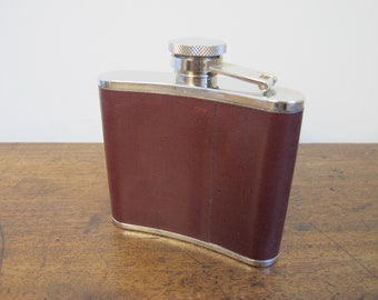 Vintage hip flask. Brown leather covered metal screw-top curved flask. Made in England - 4 oz